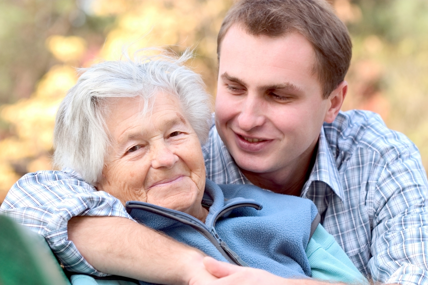 bigstockphoto_Elderly_Person_With_Grandson_1057843